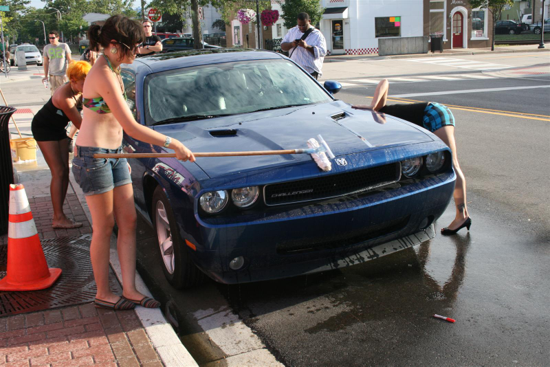 Illustration for article titled Noir Leather Bikini Car Wash Meetup Pictures